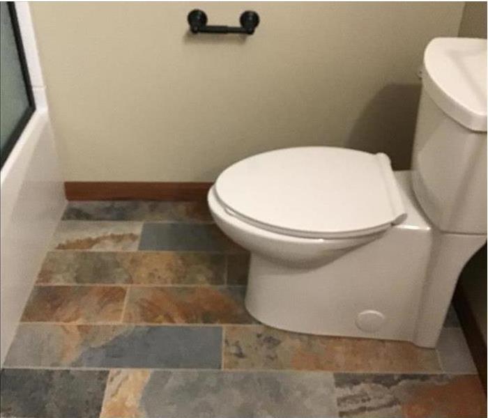 A picture of the same bathroom after being remodeled. 