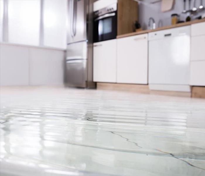A picture of a close up in a kitchen with water damage.